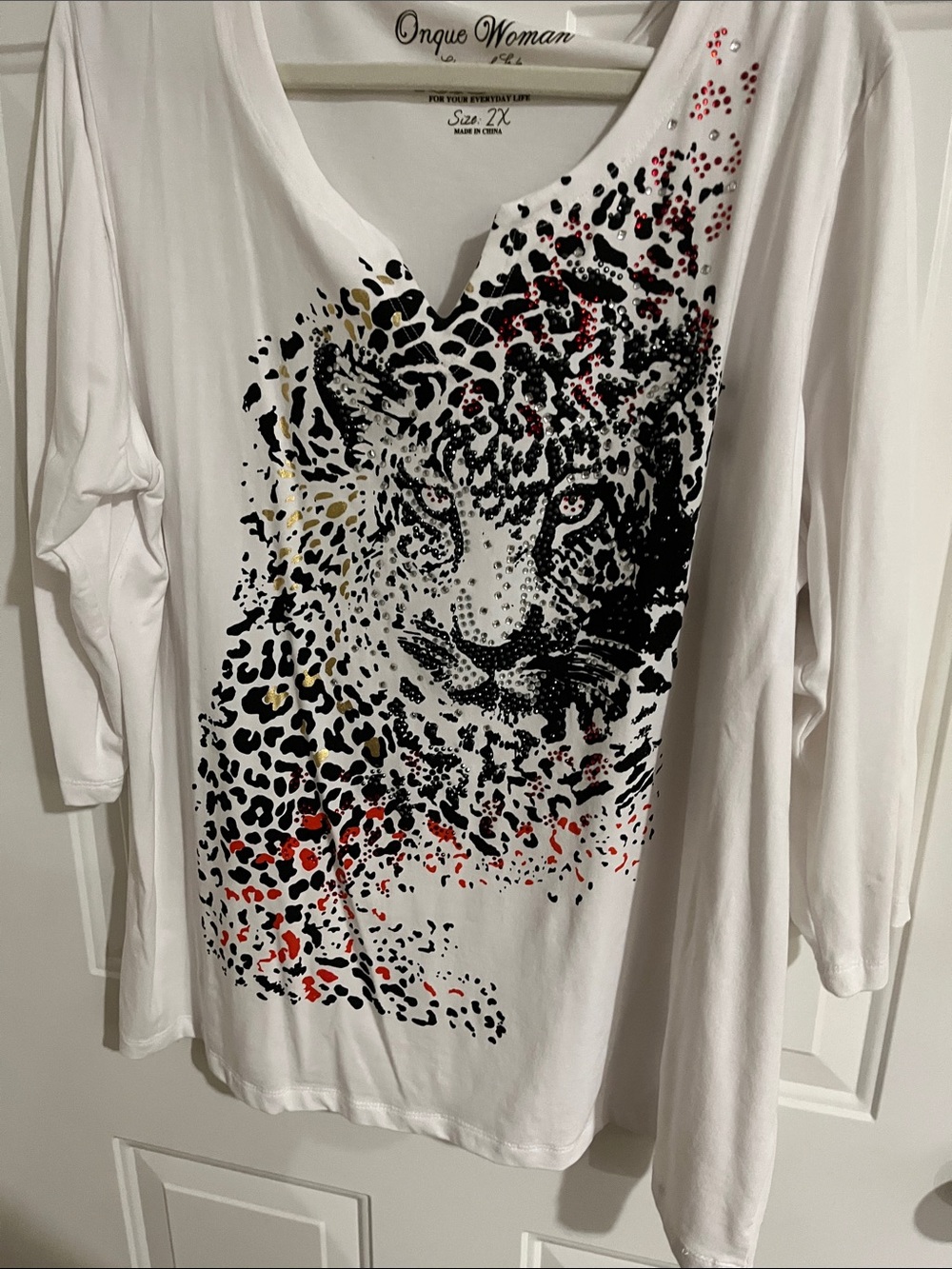 Onque Woman White Leopard Face Long Sleeve Tee with Red & Gold Accents